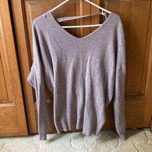 Women’s size medium color gray/purple sweater  with open back